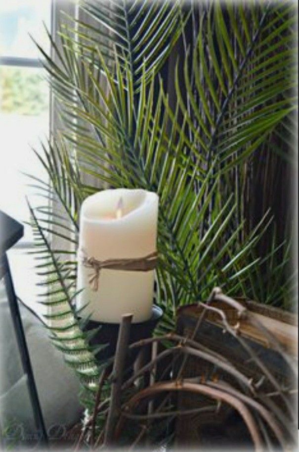 Candles Flanked by Palms