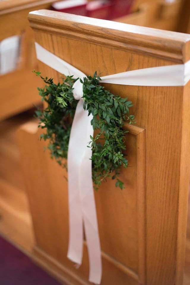 Mini Wreaths on Pews