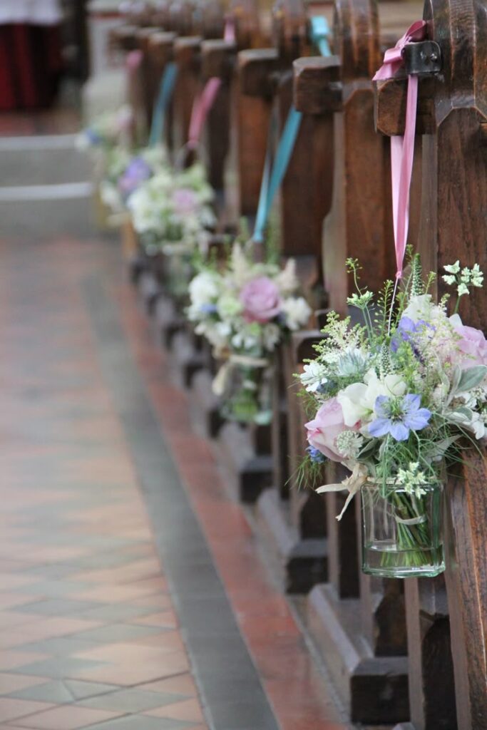 Pews with Small Flower Vases