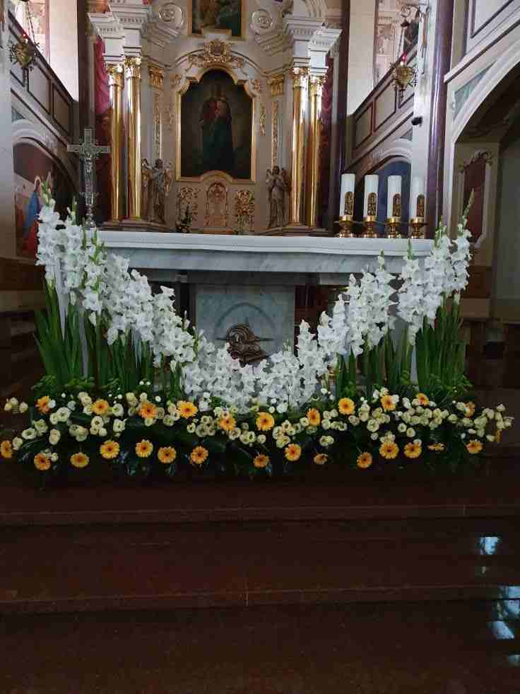 Seasonal Flower Garland Around Altar