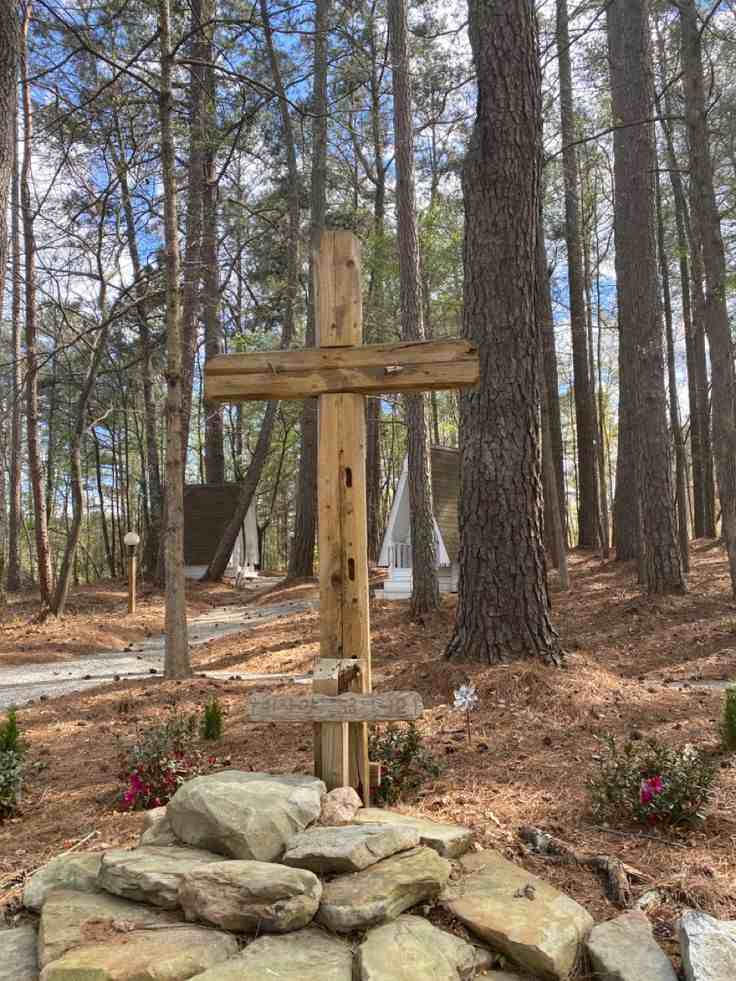 Cross Surrounded by Pebbles
