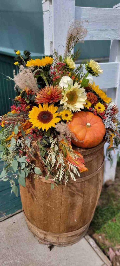 Rustic Barrel and Pumpkin Arrangement