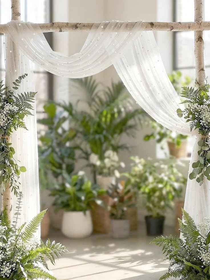 White Drapes and Greenery Design