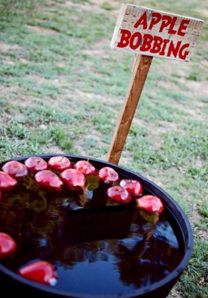Apple Bobbing or Apple Scoop Game