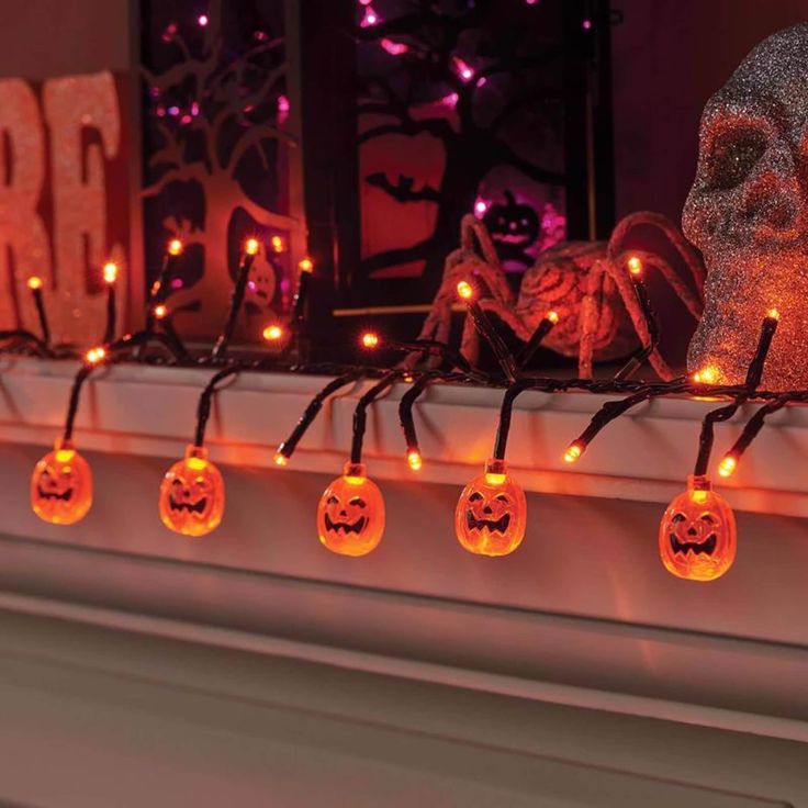 Orange Lights and Mini Pumpkin Mantel