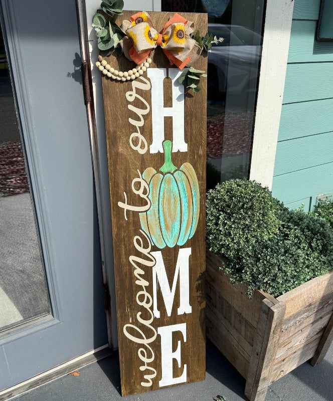 Wooden Welcome Sign with Autumn Greenery